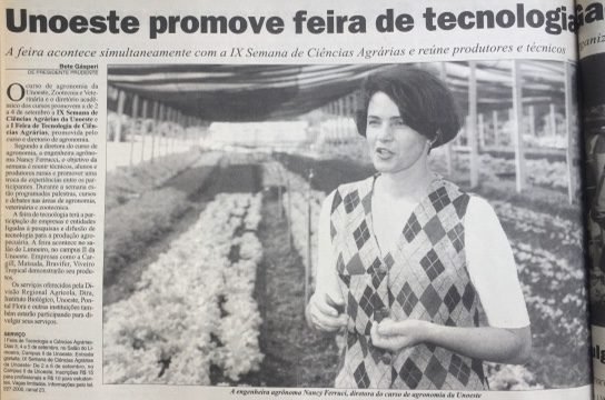 Recorte de jornal sobre feira de tecnologia, com fotografia de Nancy Thame em uma estufa.